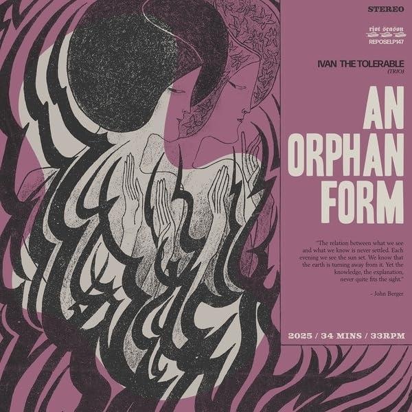 An Orphan Form/Crystal Clear Vinyl with Purple Blob and Black Splatter