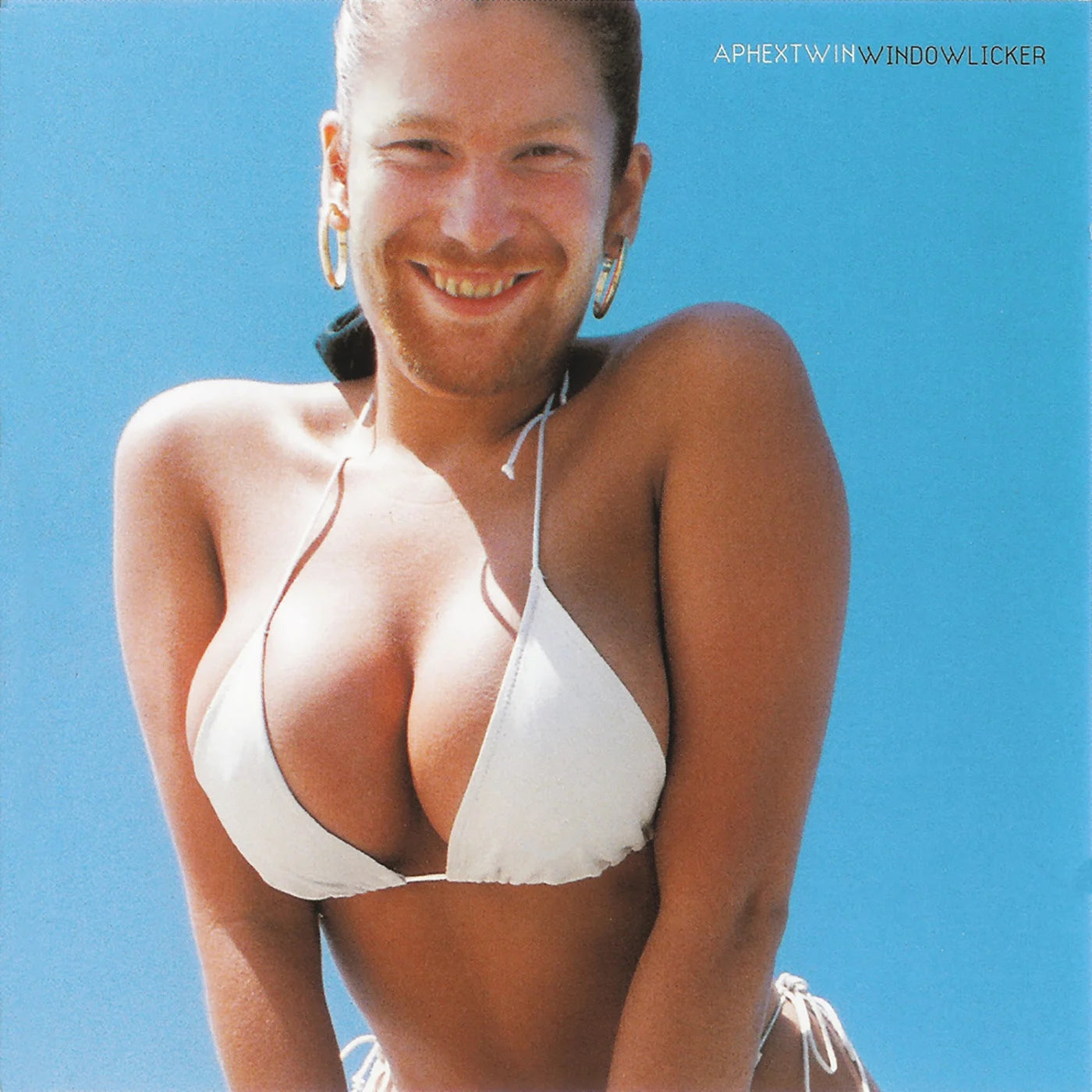 Pochette de disque dérangeante : Windowlicker d'Aphex Twin (1999), fille en bikini au visage barbu de l'artiste